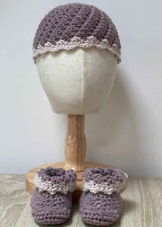 Pink and dark pink baby hat and bootie set.