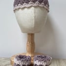 Pink and dark pink baby hat and bootie set.