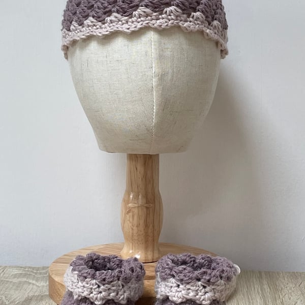 Pink and dark pink baby hat and bootie set.