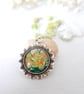 Green Pendant Necklace with Flower Art and Rosary-style Beadwork  - Image 4
