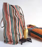 Beach or tote bag made in stripy colourful deck chair fabric with foldaway pouch
