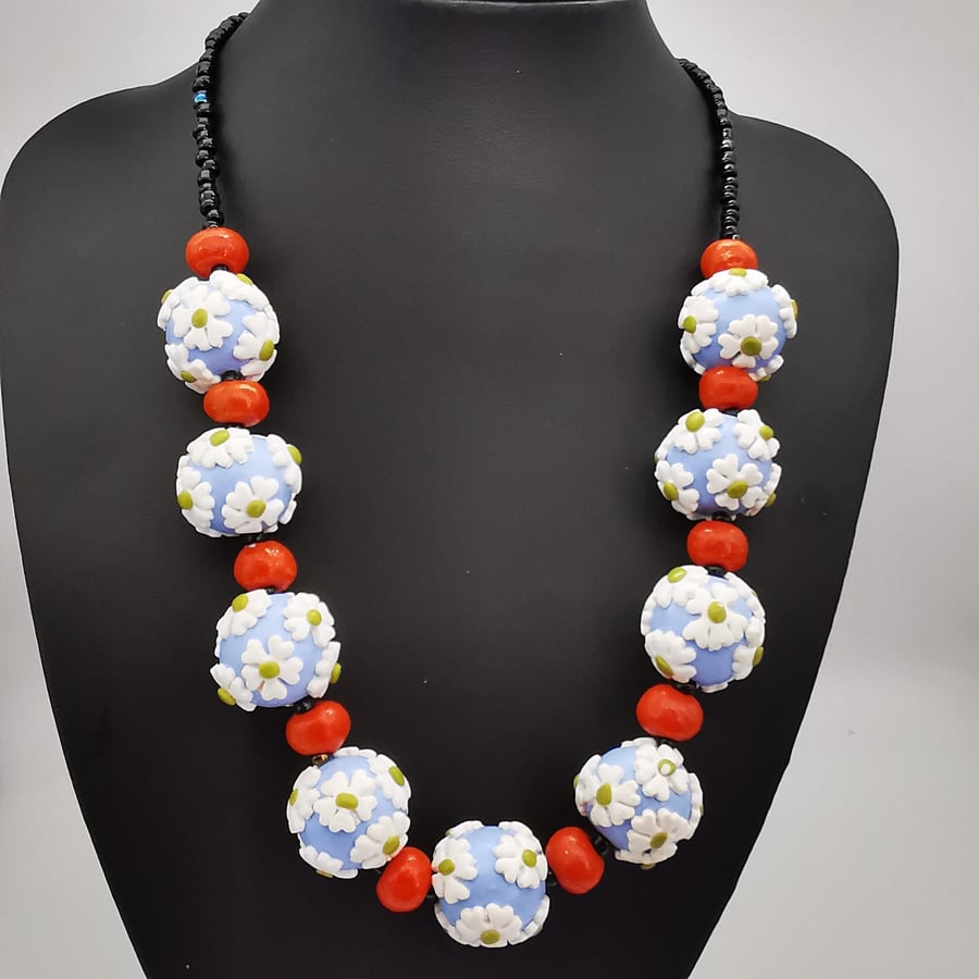 Distinctive beaded necklace, daisy design, handmade, polymer clay