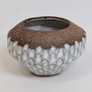 Coiled and hand-carved bowl