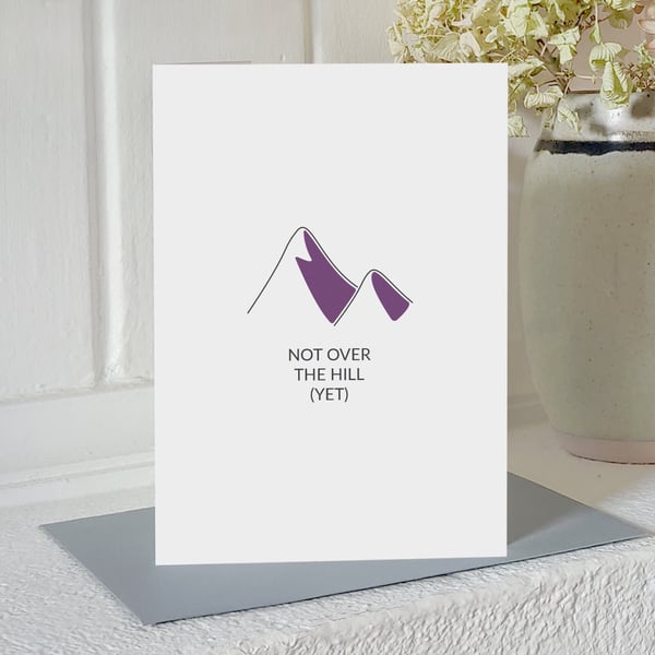 Mountain climbing birthday card - "not over the hill (yet)"