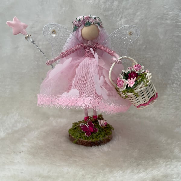 Beautiful Pink Flower fairy standing ornament, keep sake