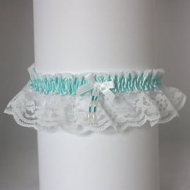 White lace wedding garter with aqua trim