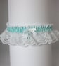 White lace wedding garter with aqua trim - Image 1