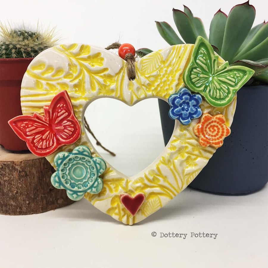 Heart shaped Ceramic floral wreath decoration with butterflies and flowers 