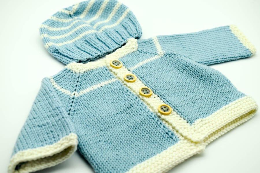 SOLD Hand Knitted baby cardigan and hat set in blue and white Newborn
