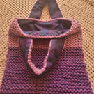 Hand knitted. 2 tone purple bag.  Tartan lined 