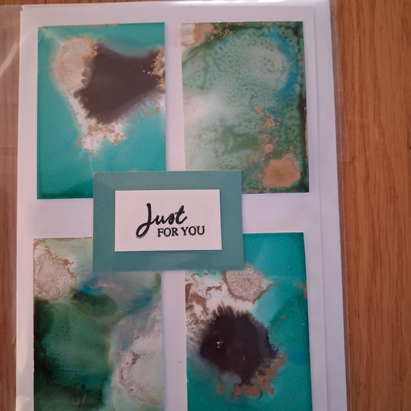 Handmade greetings card made with alcohol inks