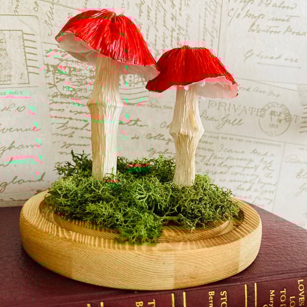 2 Red paper forest mushrooms in a glass dome 