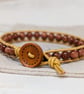 Goldstone and metallic gold leather bracelet with wooden button fastener  - Image 4