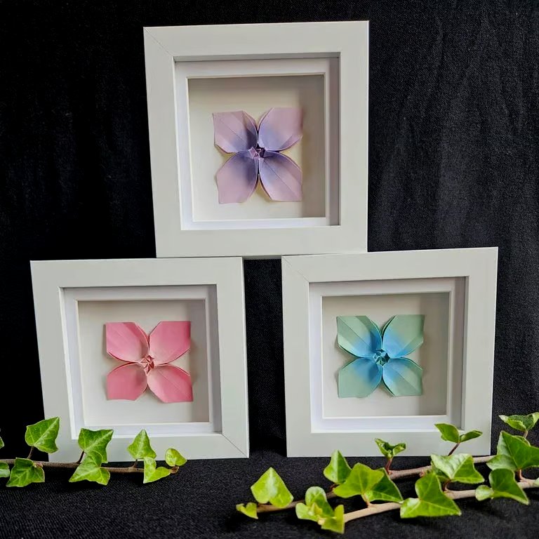 Set of three origami flowers in shadow box frames