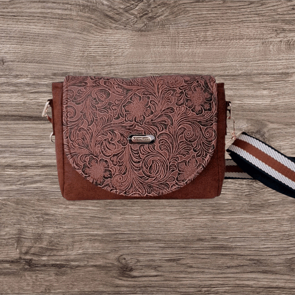 Handmade Faux suede crossbody bag with a light brown patterned flap