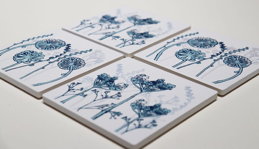 Set of four blue botanical ceramic sandstone coasters