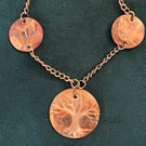 Hand-engraved burnished copper necklace with tree & leaves motive