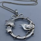 Handmade sterling silver pendant with wren and ivy leaves