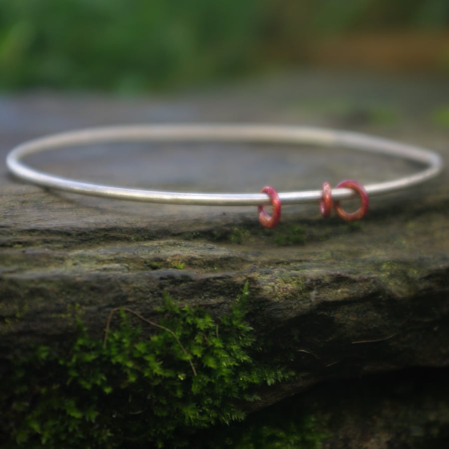 Sterling Silver Bangle with Copper Spinners