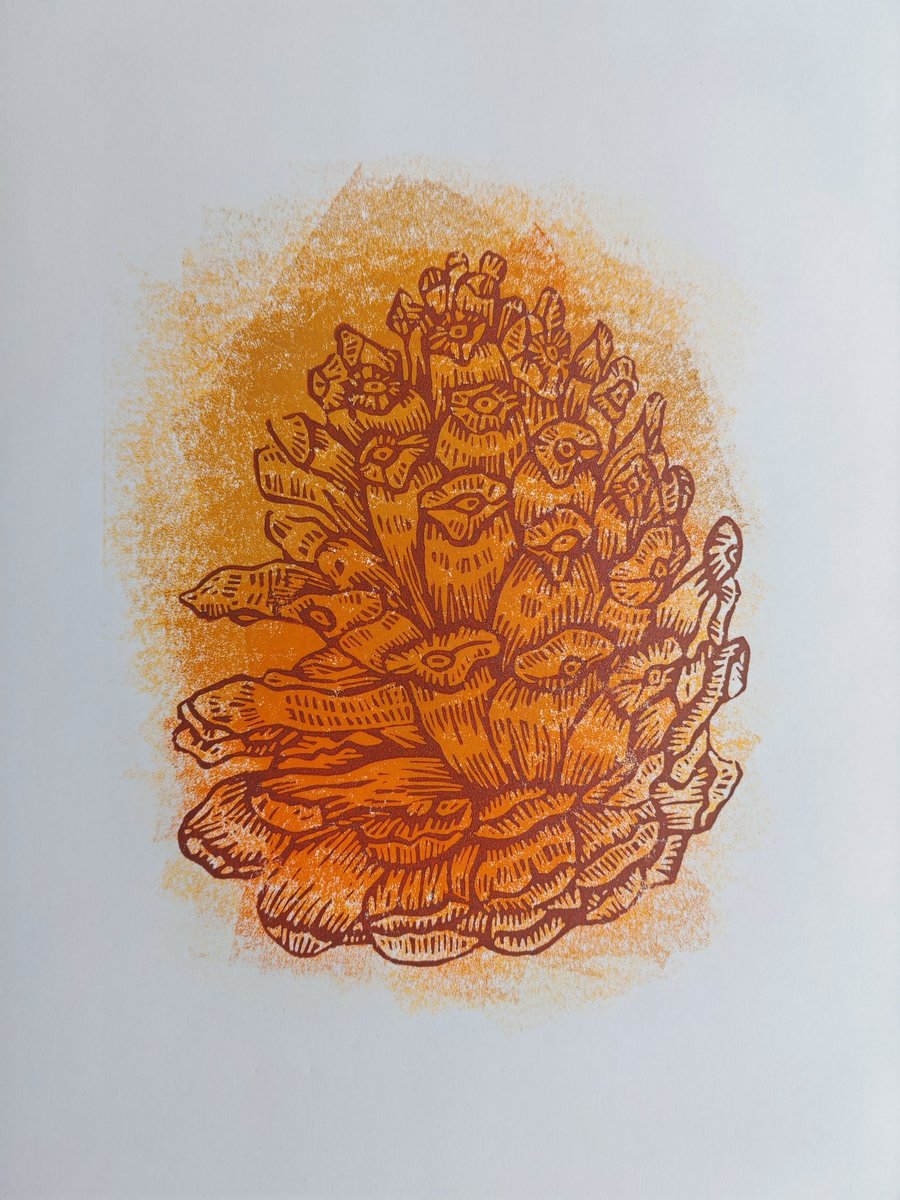Autumn pinecone with autrumn painterly background