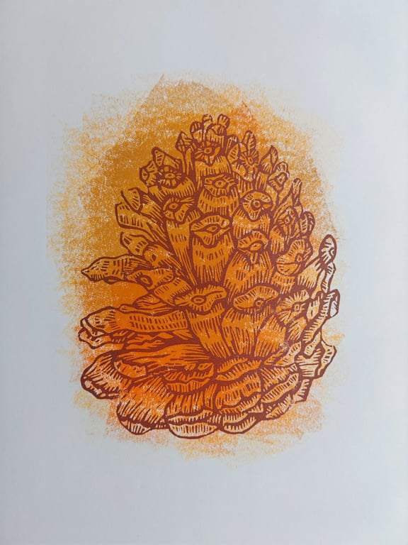 Autumn pinecone with autrumn painterly background