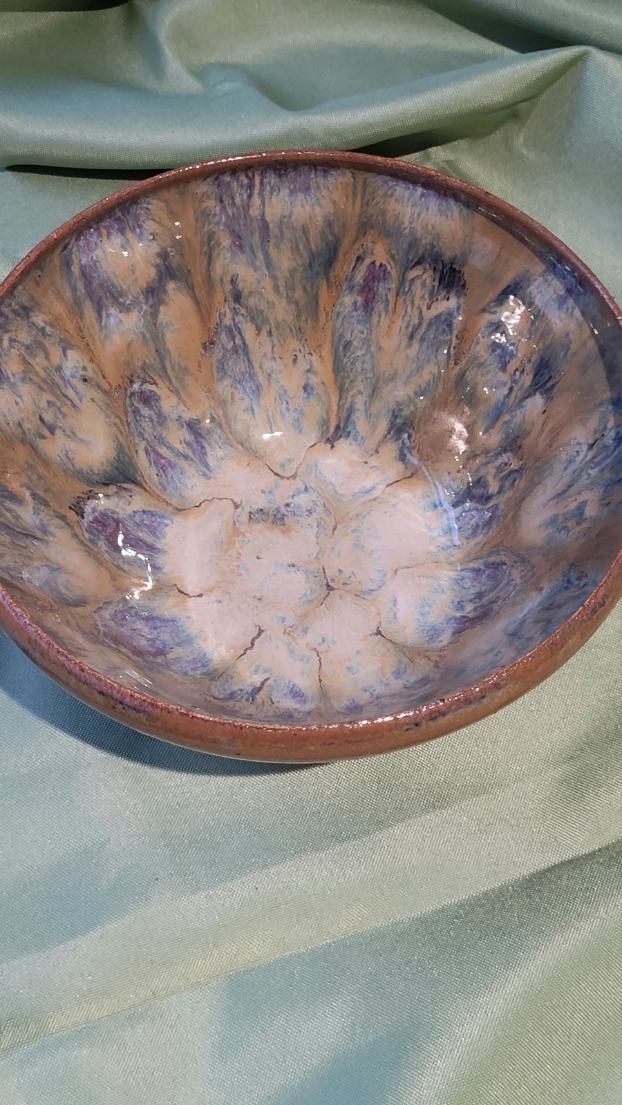 Patterned brown, blue, green, purple bowl handmade pottery