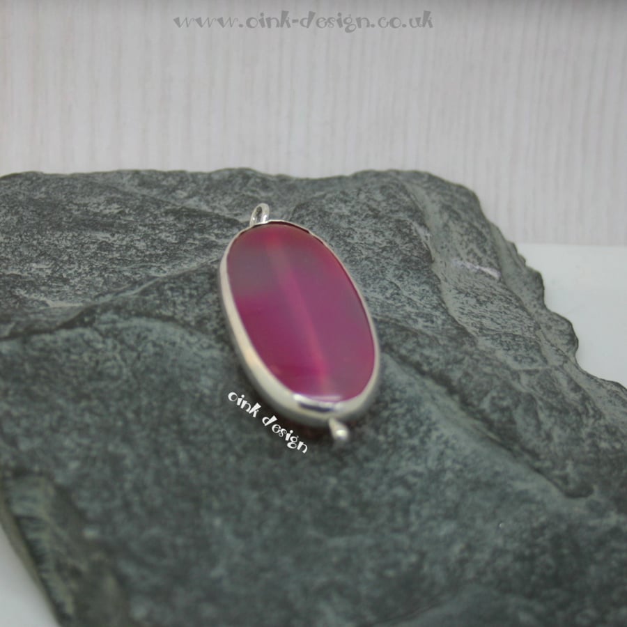 A beautiful pink agate stone set in sterling silver