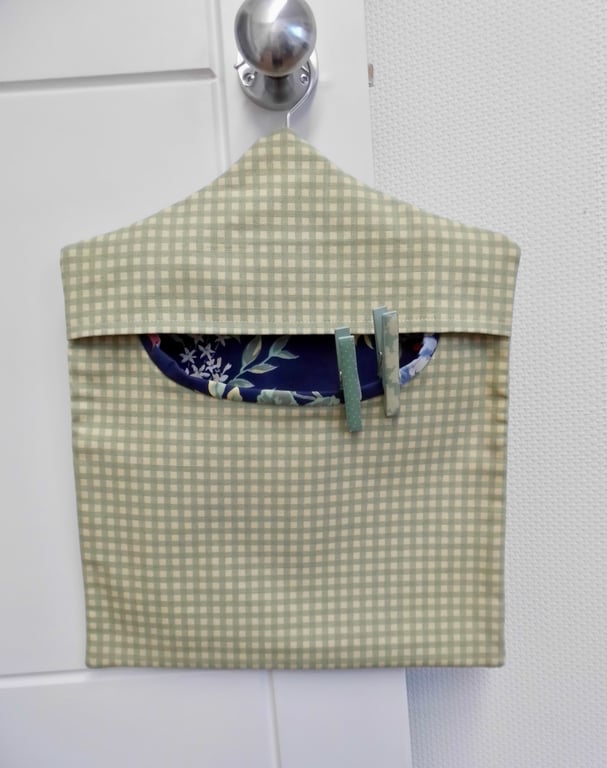 Peg bag in blue-green check with floral lining
