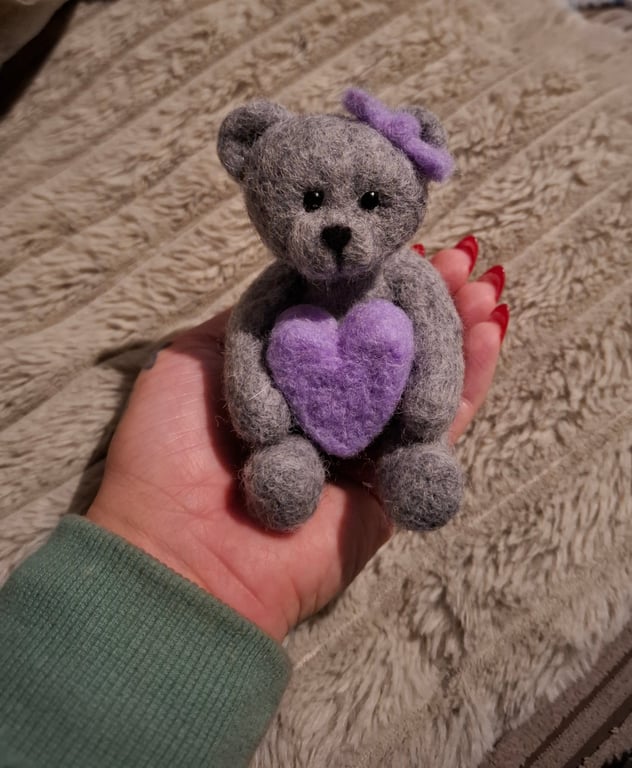 handmade needle felted teddy bear holding heart