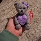 handmade needle felted teddy bear holding heart