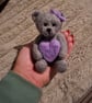 handmade needle felted teddy bear holding heart