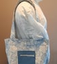 Blue tote bag with pockets and magnetic popper fastening.   - Image 2