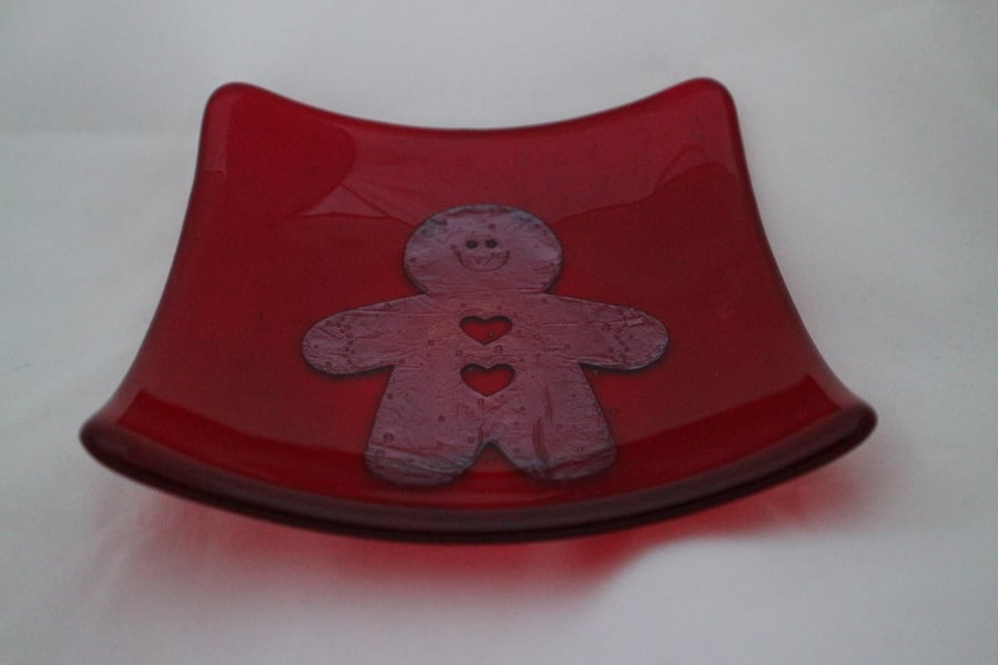 Hand made fused glass candy bowl - copper gingerbread man on red