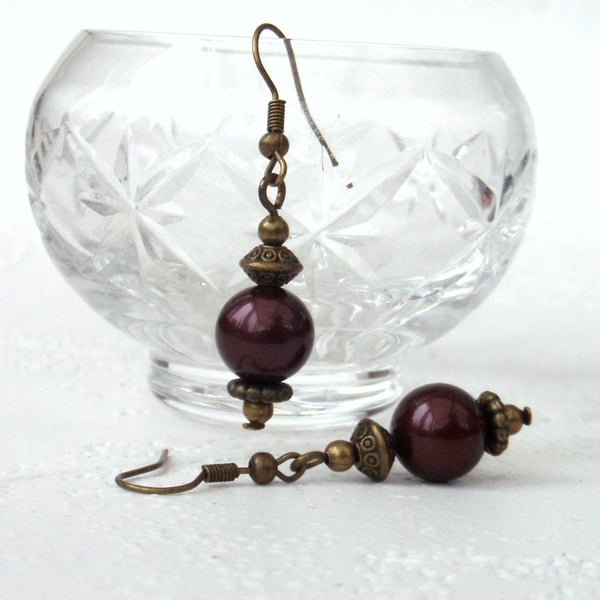 Bronze earrings with burgundy  shell pearl