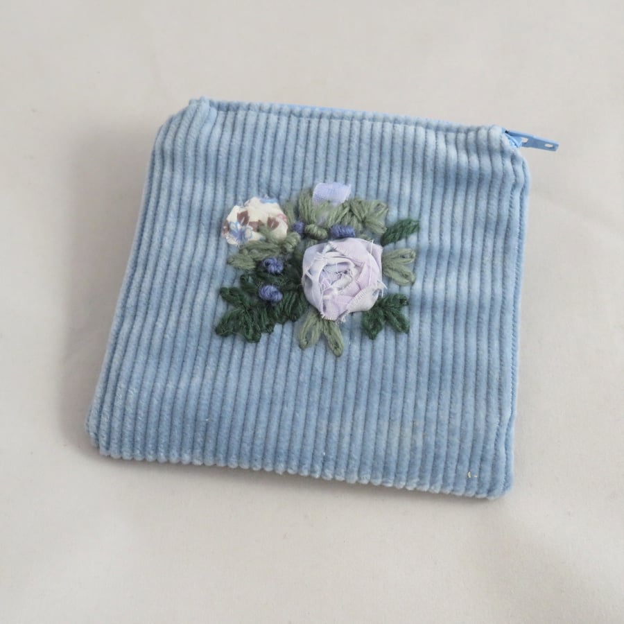 Embroidered zipped corduroy purse