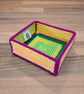 Small tray for small desk items - yellow, green, and orange with magenta edging - Image 1