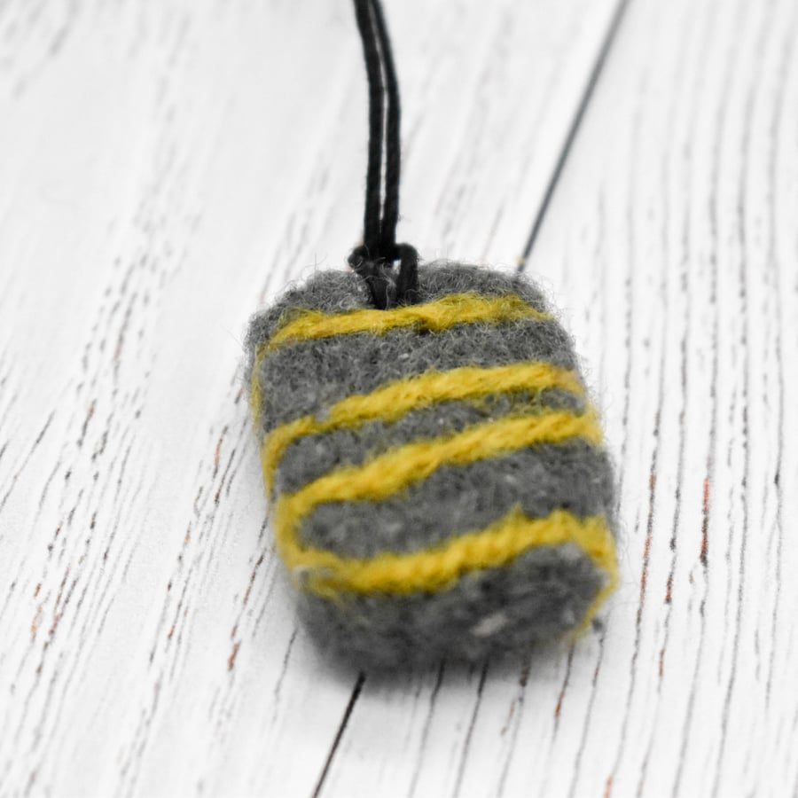 Felted pebble necklace in grey and  ochre yellow wool