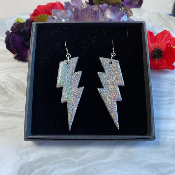 Lightning bolt silver glitter polymer clay statement earrings on sterling silver