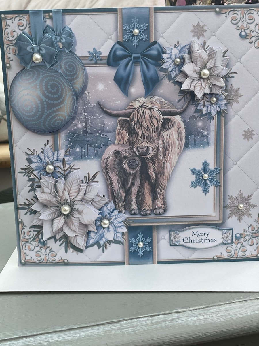 Highland cow and calf in a snowy scene Christmas card