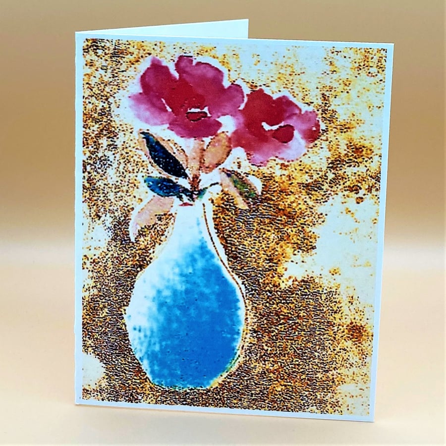 Birthday Greetings Card, Pink flowers in a blue Vase, 'Happy Birthday' message. 