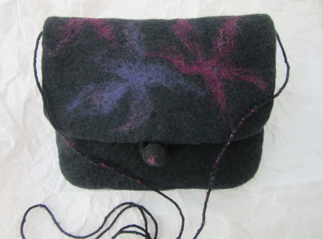 Black shoulder bag hand felted with merino wool