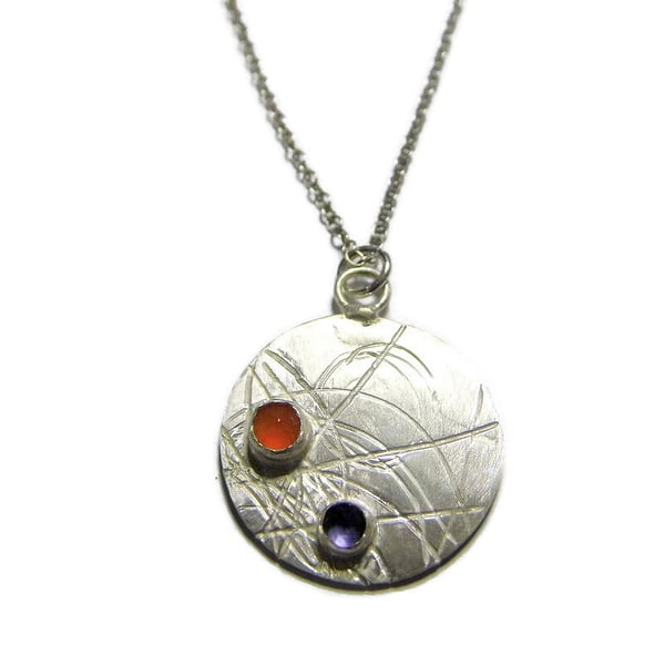 rose cut carnelian and iolite on roller printed sterling silver disc pendant