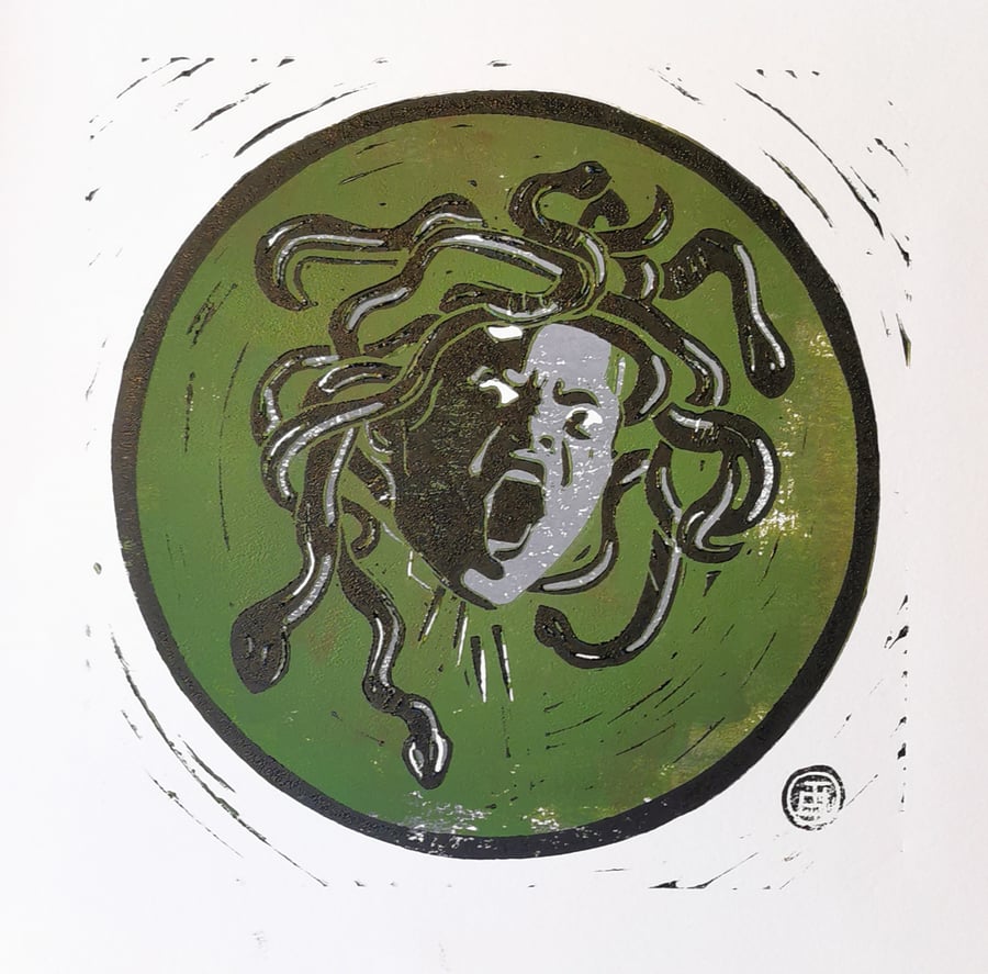 The head of Medusa, linocut print.