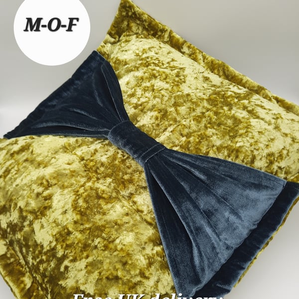 Yellow velvet bow 18" flange cushion cover. 