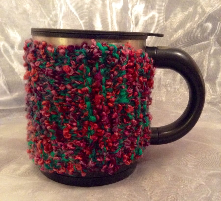 Multicoloured knitted mug warmer