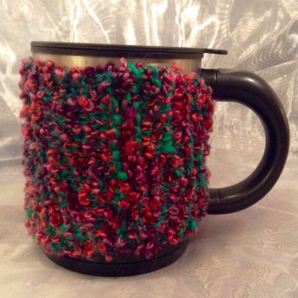 Multicoloured knitted mug warmer