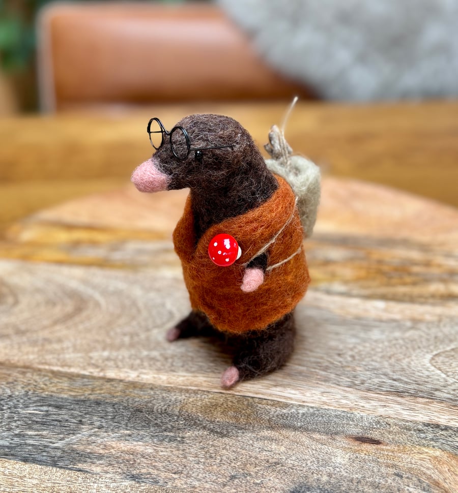 Needle felt Mr Mole carrying his firewood. Stands 16cm tall