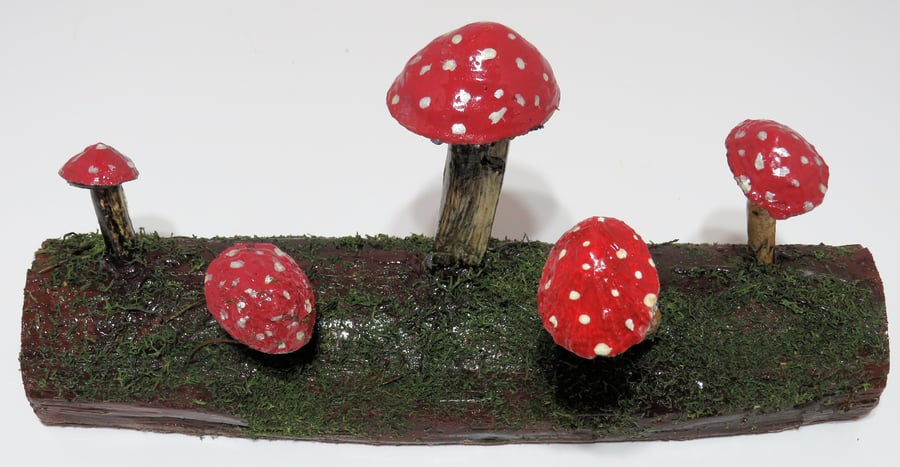 Pretty toadstool log made from re-cycled wood with driftwood and limpet shells