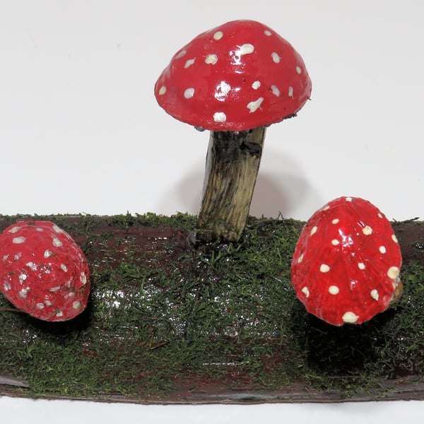 Pretty toadstool log made from re-cycled wood with driftwood and limpet shells