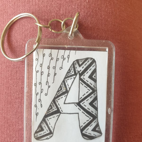 Hand drawn initial "A" keyring.